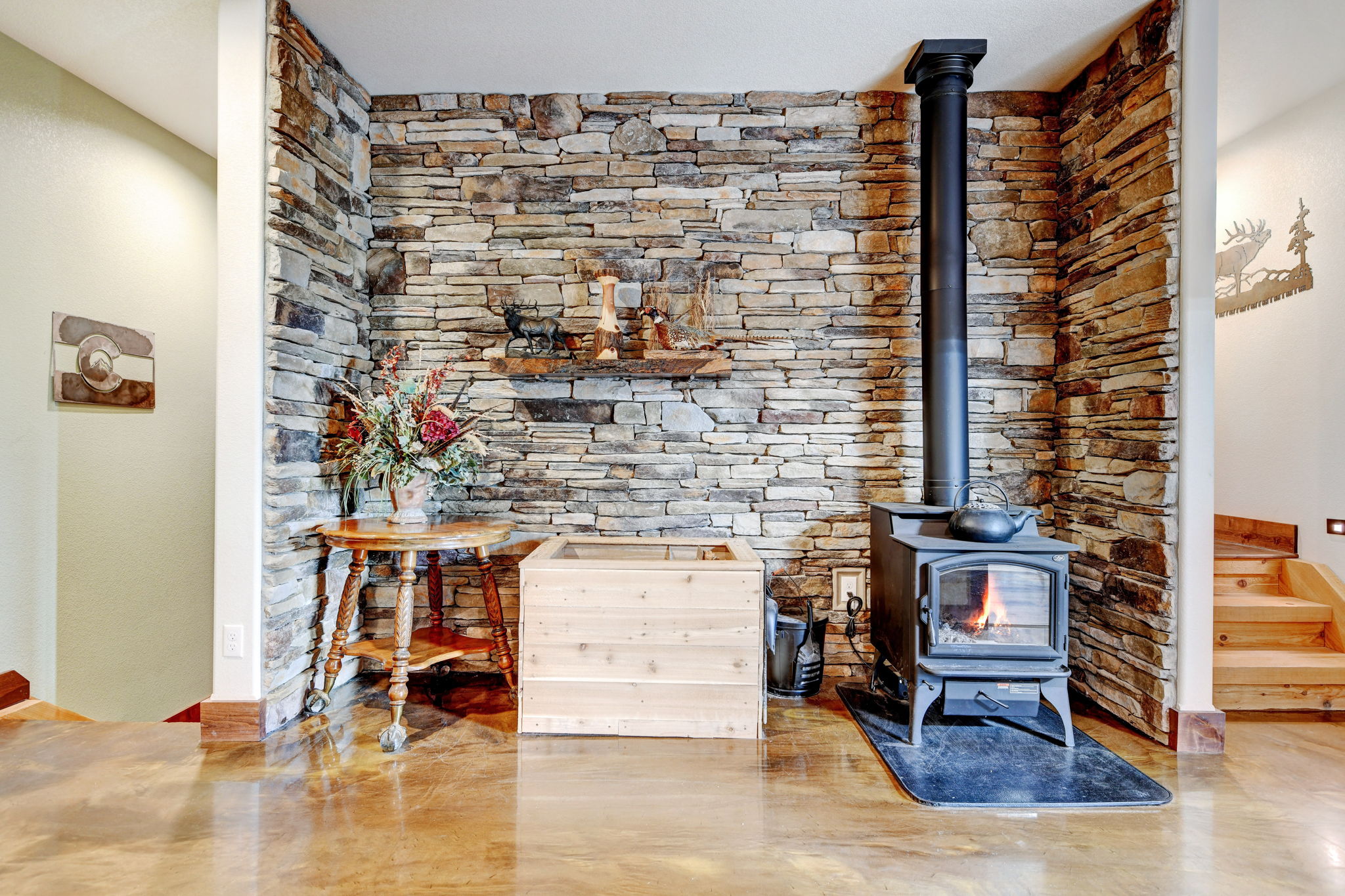 Cozy Wood-Burning Fireplace with Electric Starter in Rec Room