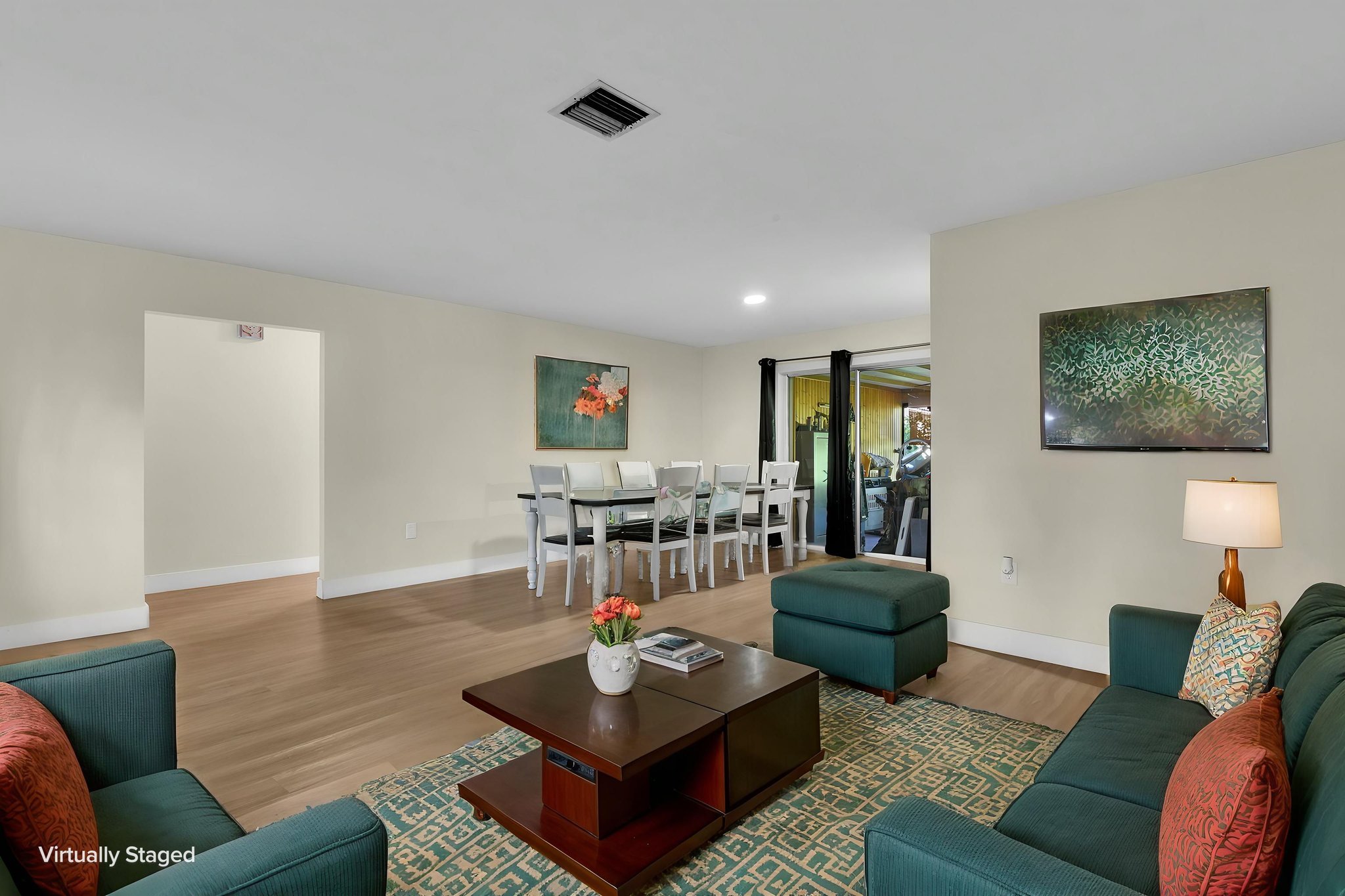 Living Room & Dining Area virtually staged.jpeg