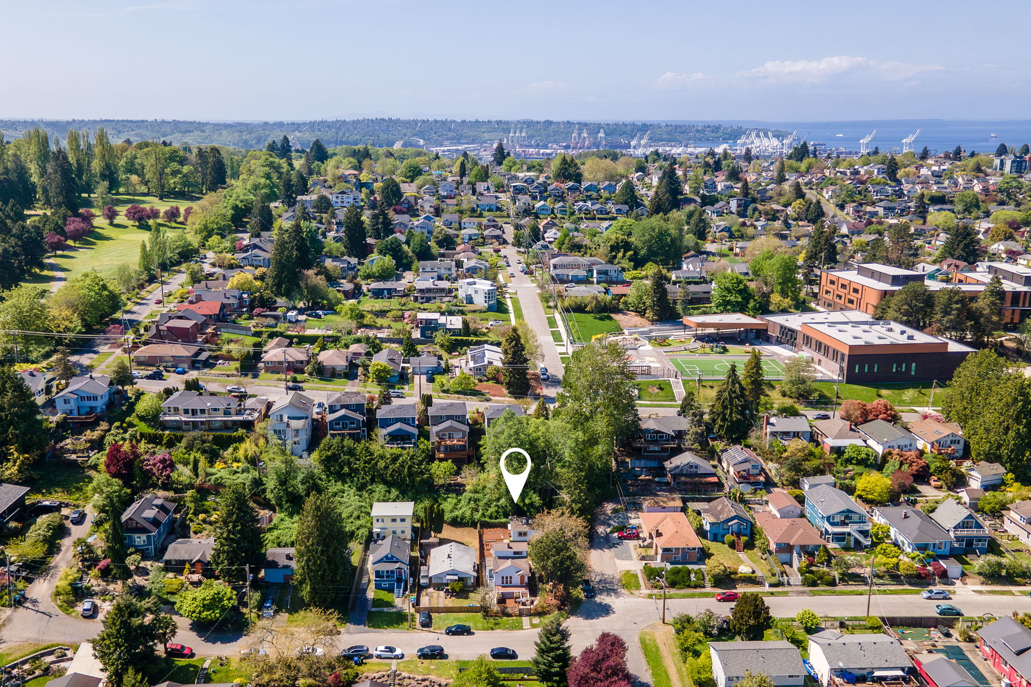 To the west, the wide green stretches of Jefferson Golf Course come into view, with West Seattle and the shimmering Puget Sound beyond. It’s a view that blends green space and open skies—peaceful, panoramic, and full of that easy Seattle magic.