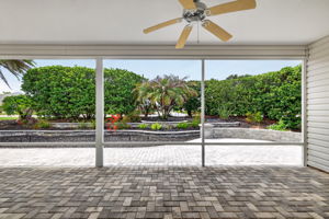 PAVER Lanai and EXPANSIVE Rear Patio with HARDSCAPING and PRIVACY Landscaping