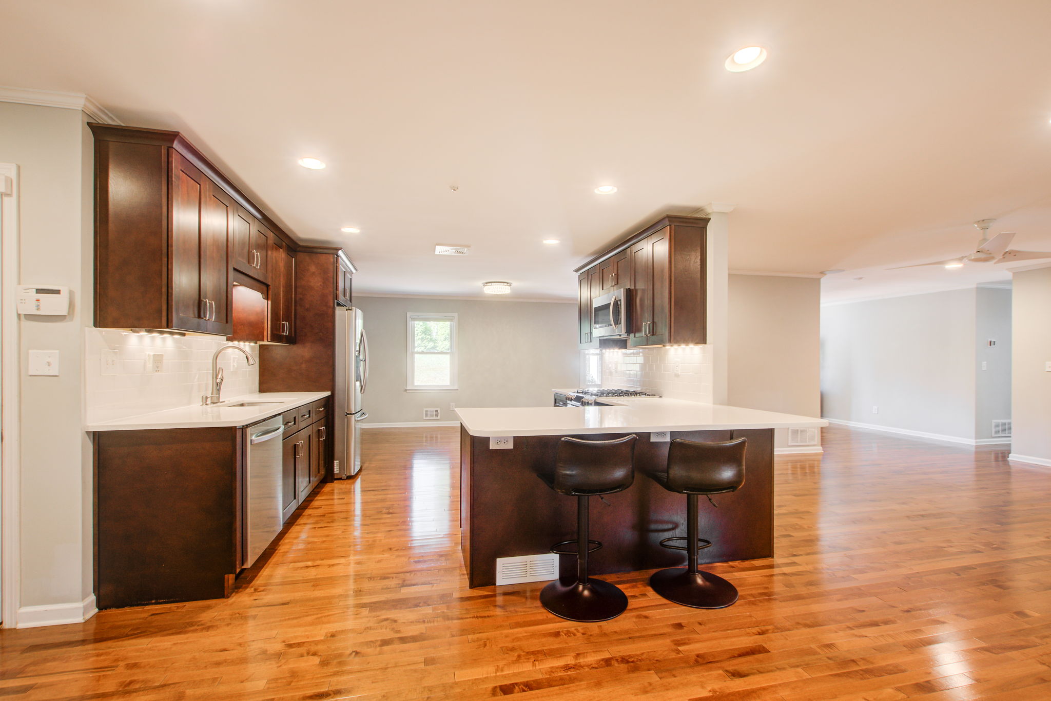 10 Kitchen D w Dining + Living