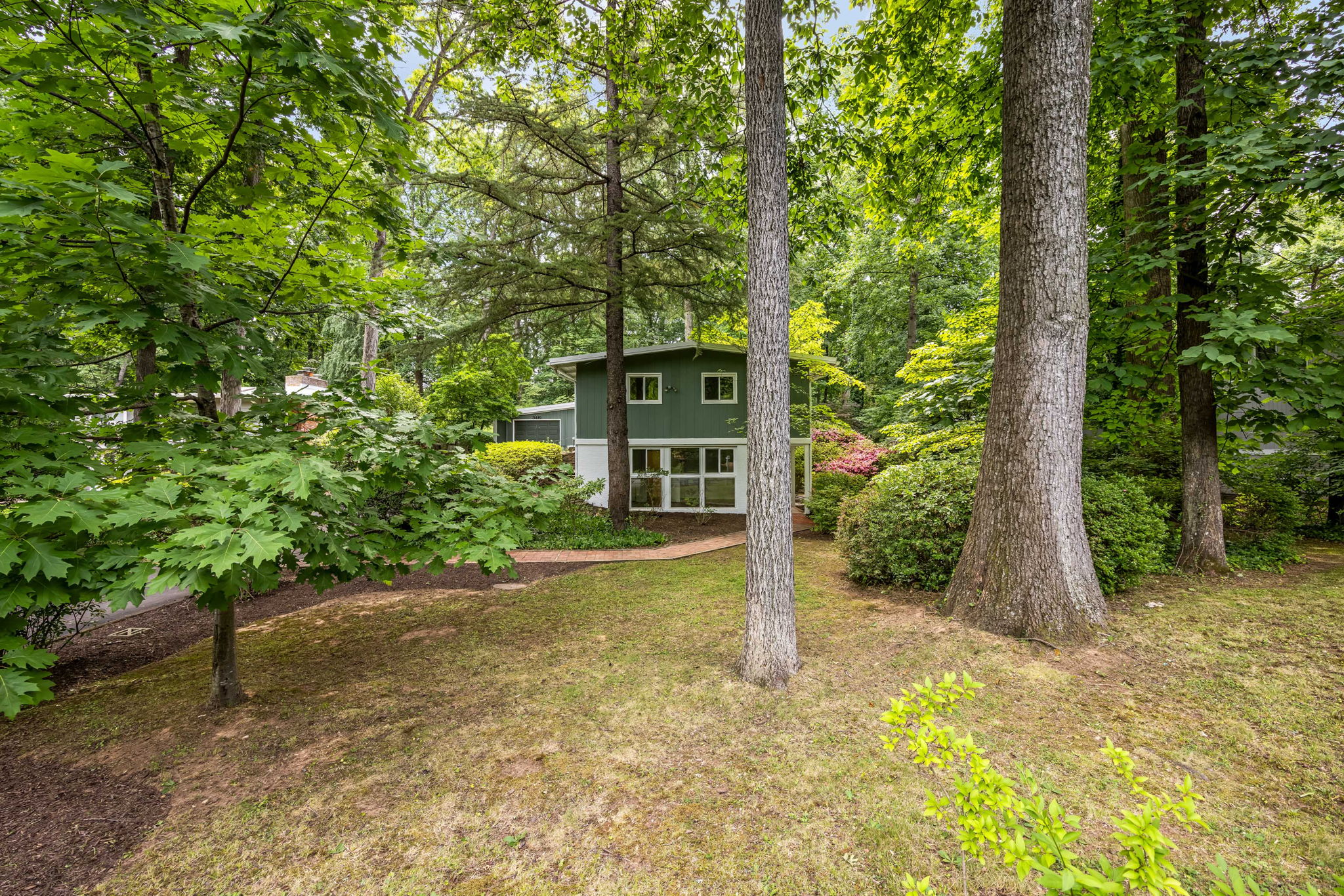 Nearly 1/2 acre private wooded lot w fenced bkyrd