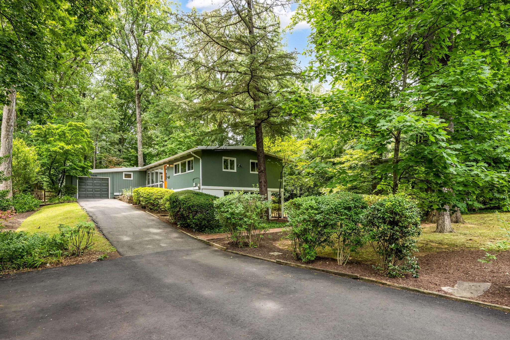 Expansive driveway and 1-car garage