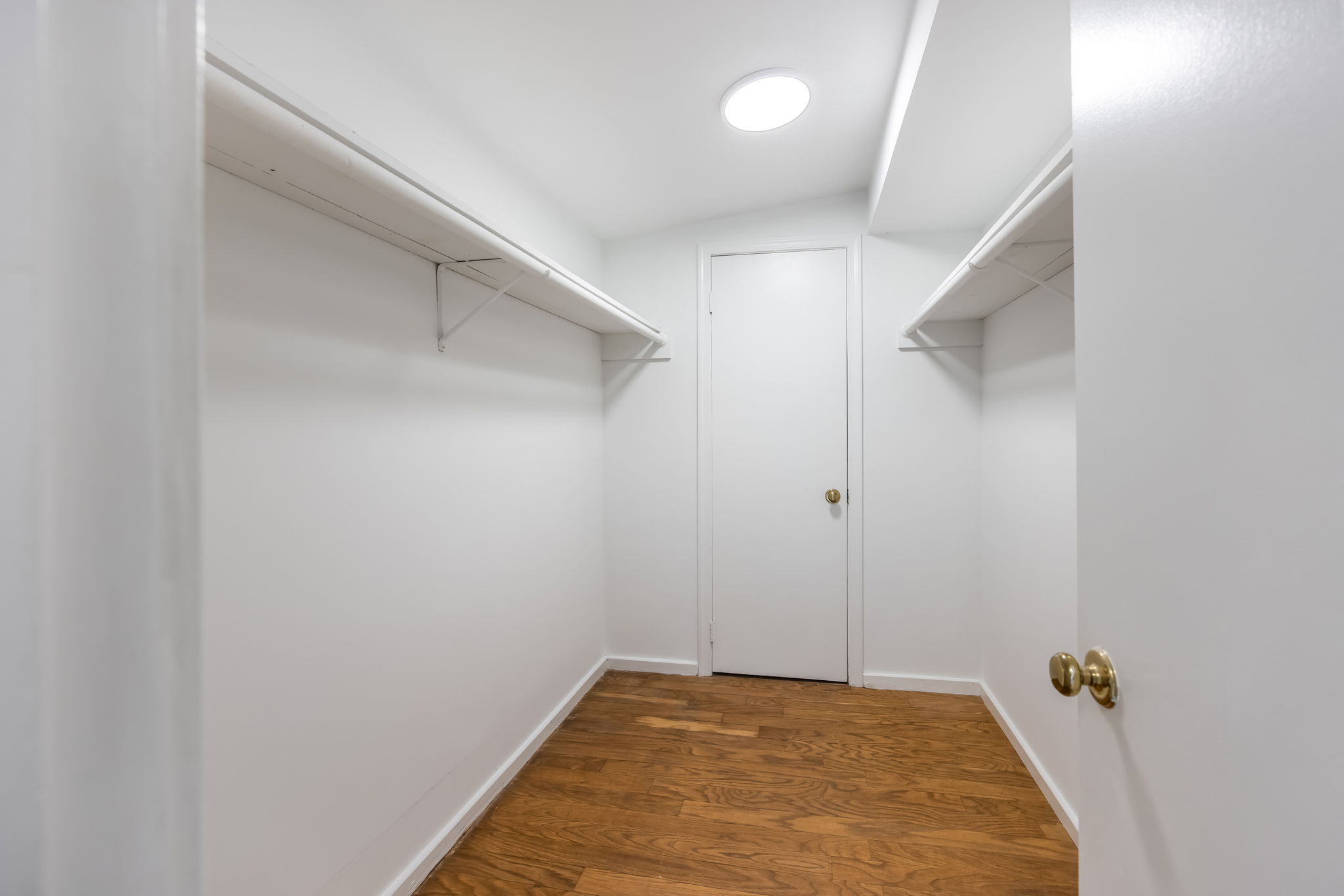 Primary Bedroom walk-in closet
