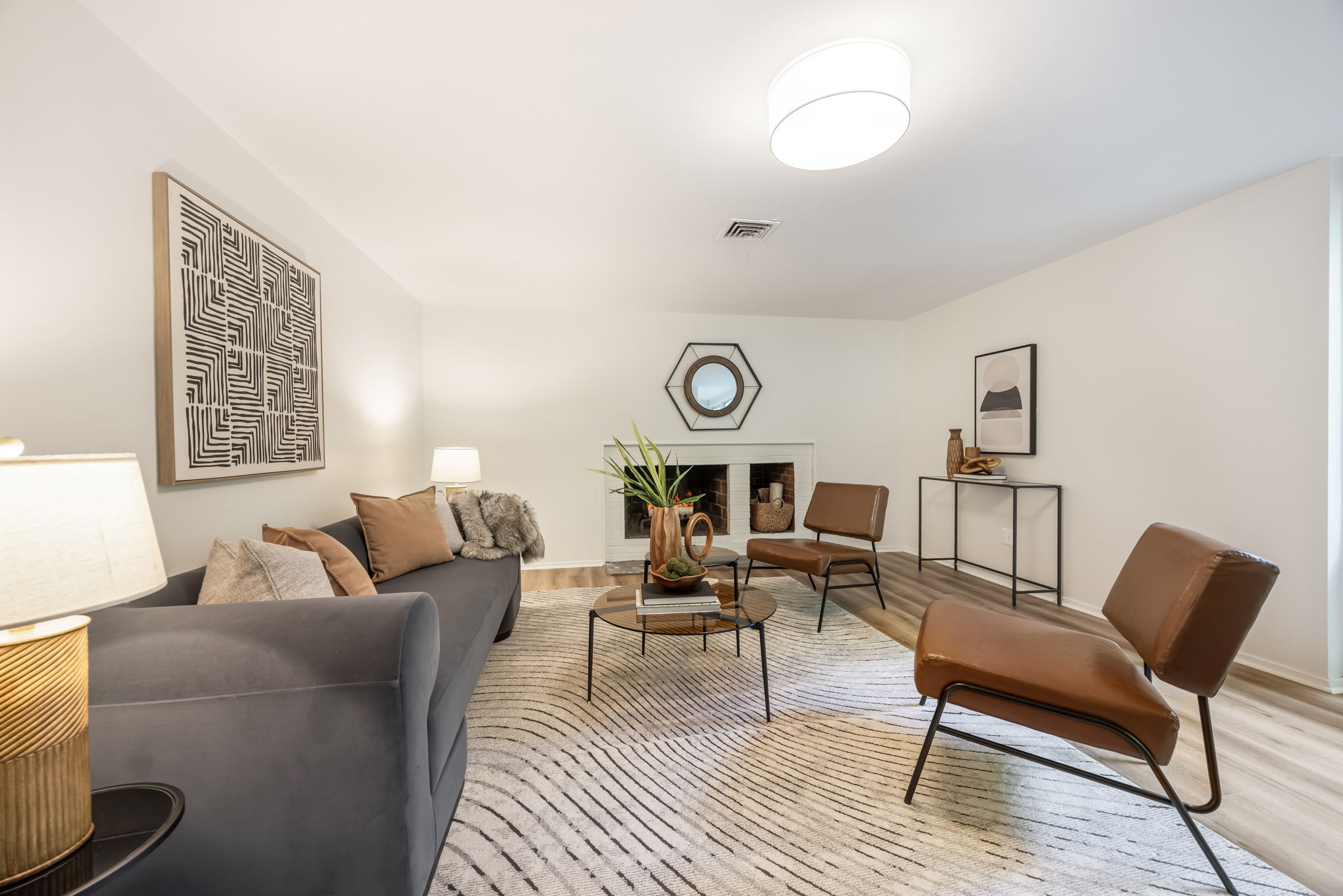 Lower level Rec Room with wood burning fireplace