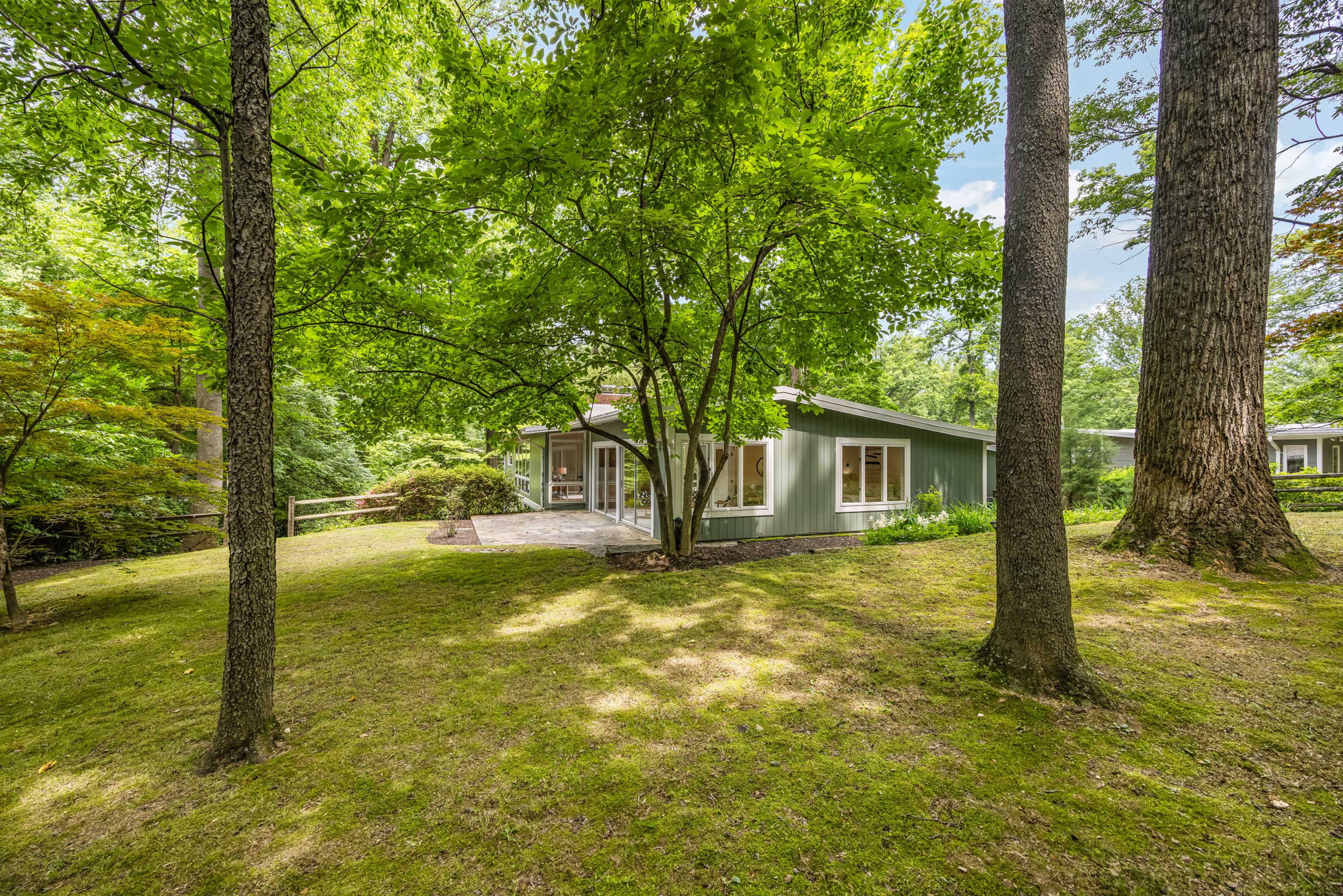 Nearly 1/2 acre private wooded lot w fenced bkyrd