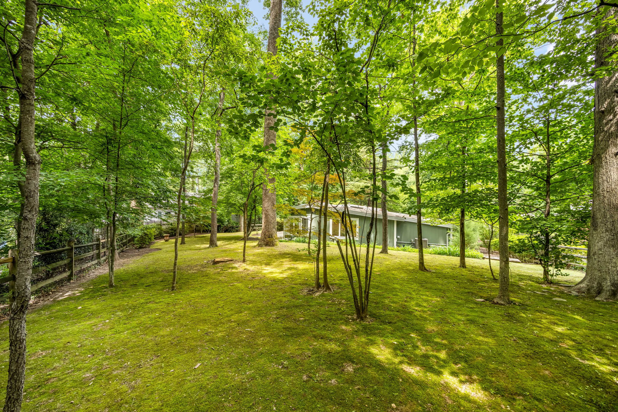 Nearly 1/2 acre private wooded lot w fenced bkyrd