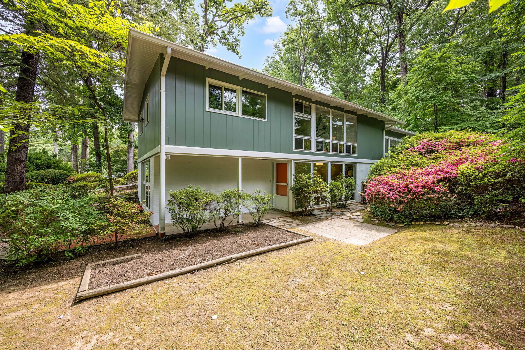 Expansive driveway and 1-car garage ​ Private entrance on lower level