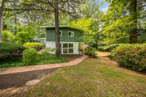 Nearly 1/2 acre private wooded lot w fenced bkyrd