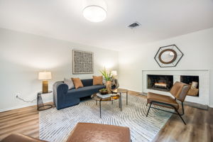 Lower level Rec Room with wood burning fireplace