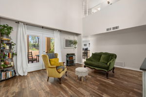 Two-story living room with French Doors