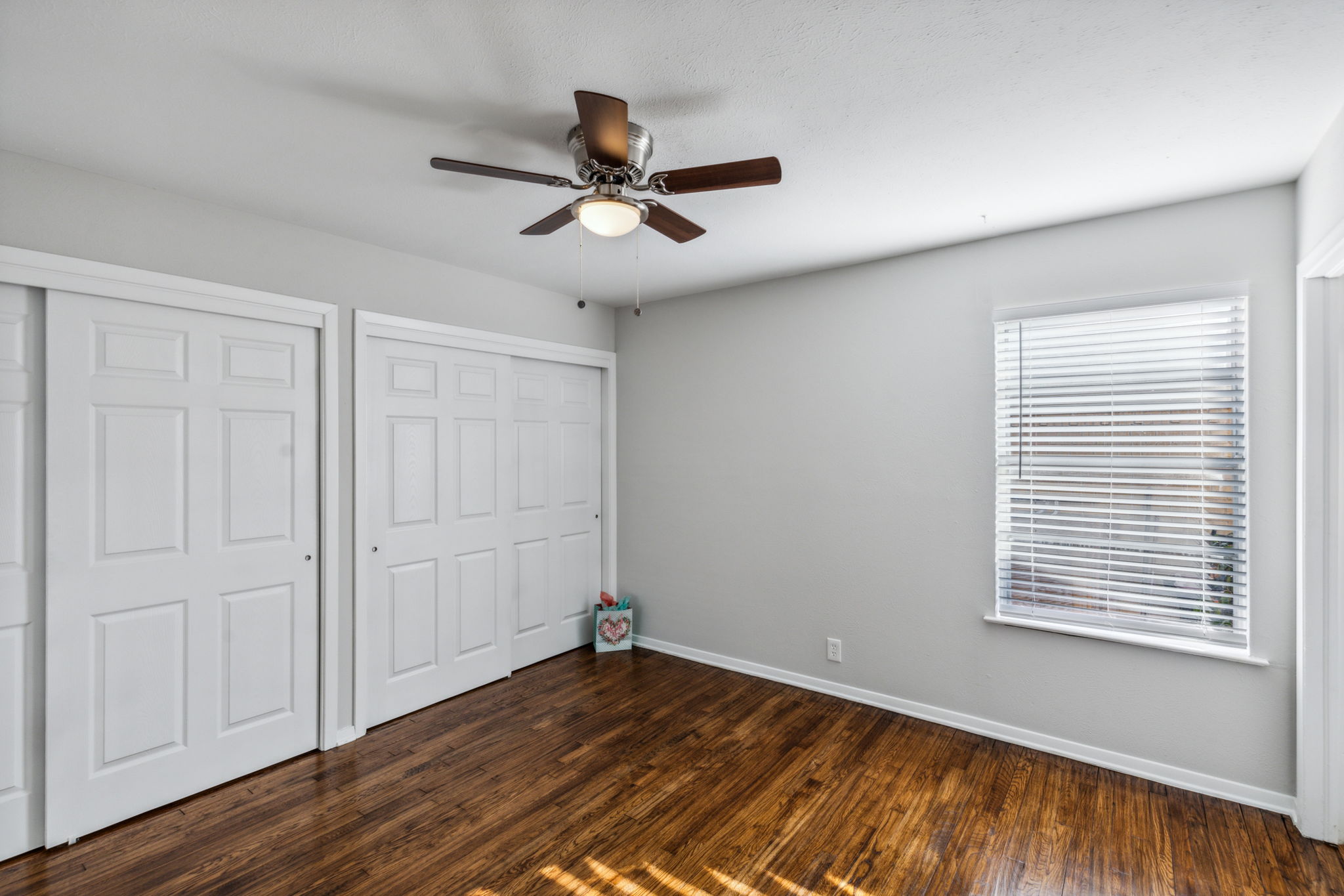 The Master Suite has TWO closets - both with NEW and tasteful closet doors - all NEW Blinds throughout the home!