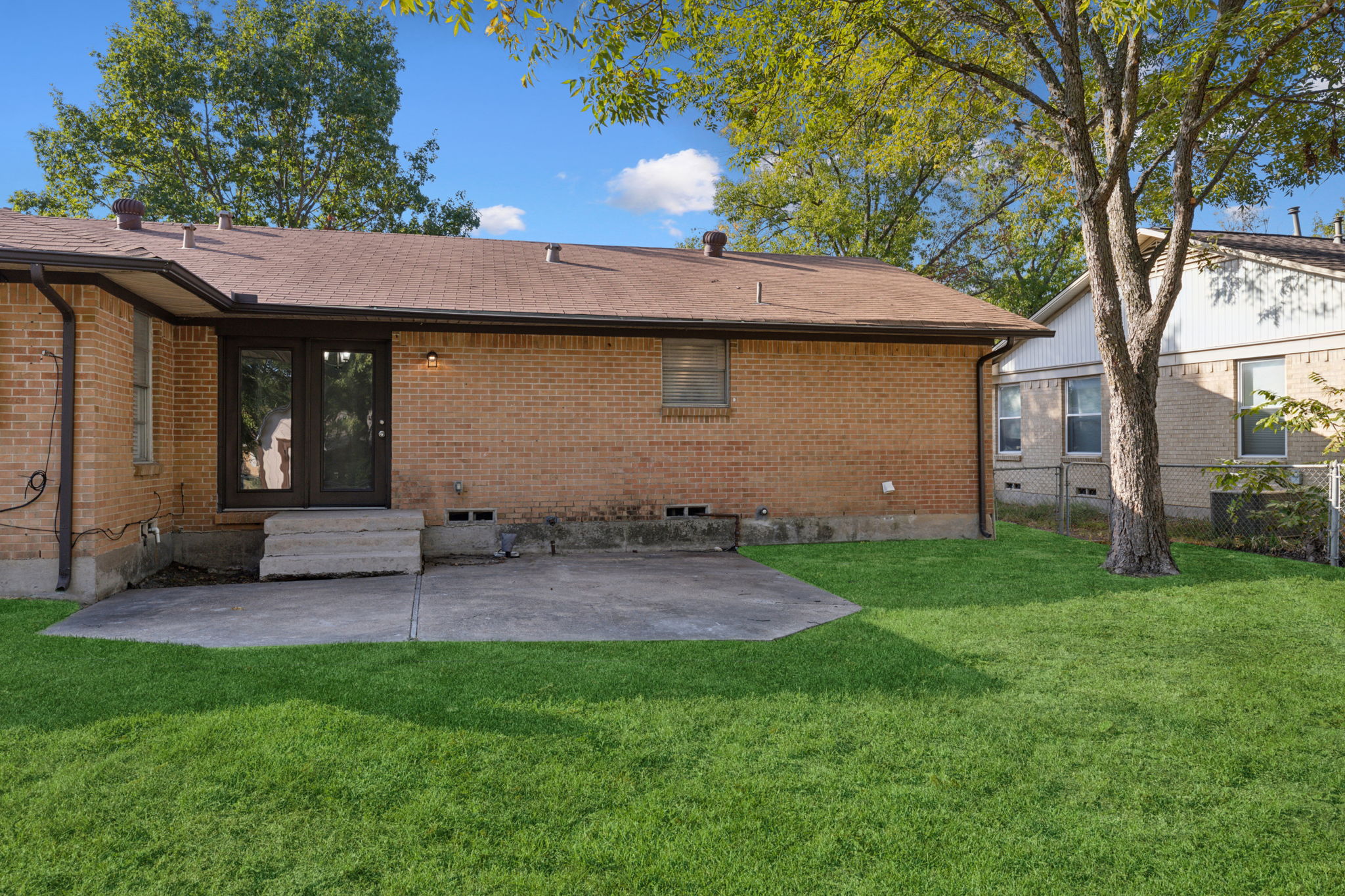 Check out the amazing Patio with French Doors to the Dining and Kitchen.