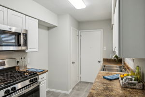 And now...this kitchen is a "show stopper"!  All NEW appliances - GAS range - Microwave - and Dishwasher!