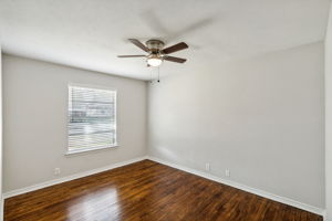 Bedroom #3 is also quite spacious - NEW Ceiling Fan, NEW Blinds, Closet Doors and WOW - GREAT view of the beautifully finished original wood flooring!