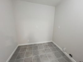 This HUGE Laundry room right off the kitchen will make you fall in love with doing the laundry again!