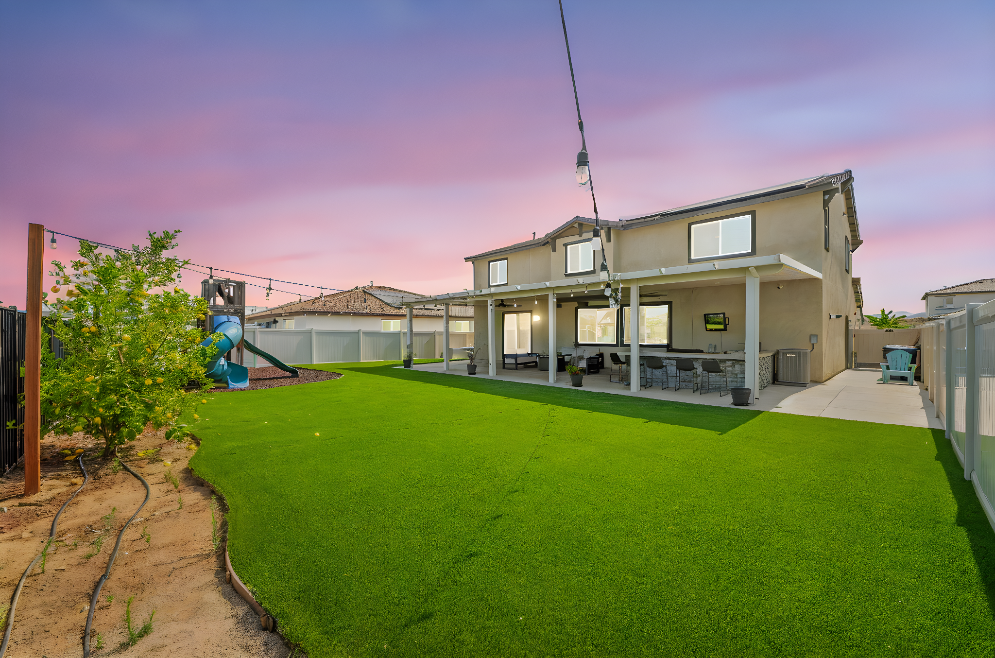 55- 34250 Swordfern Pl day to dusk.jpeg