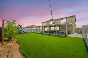 55- 34250 Swordfern Pl day to dusk.jpeg