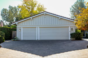 Paver driveway and spacious 3 car garage