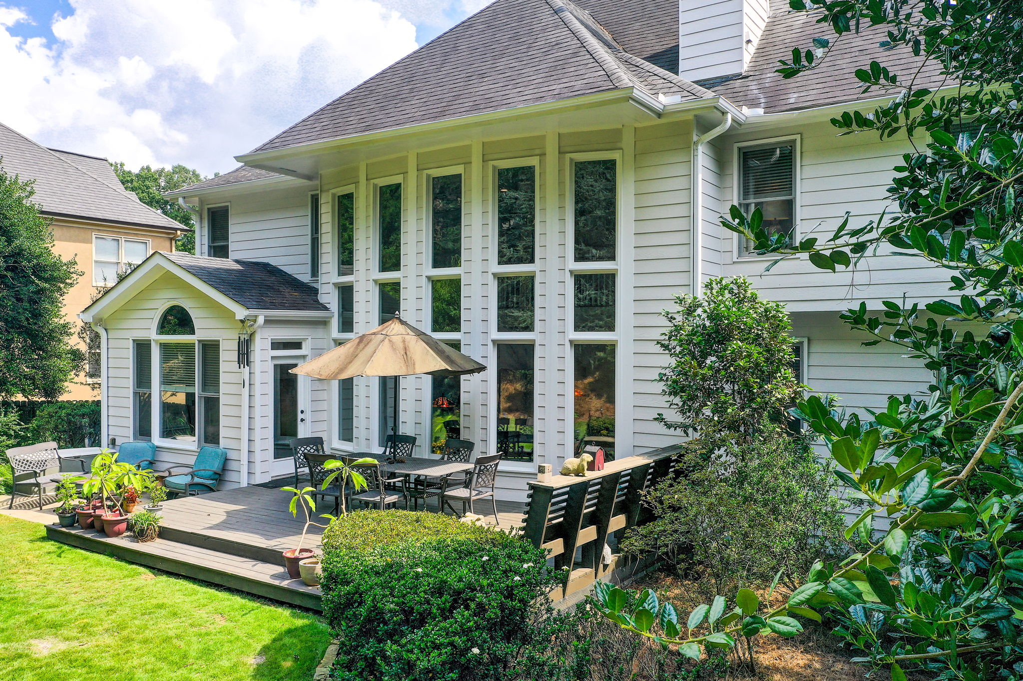 42 Aerial Exterior Rear w Deck + Patio + Partial Yard