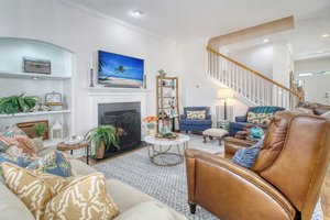 den off kitchen with a shelving & wall-mounted TV (TV conveys with home)