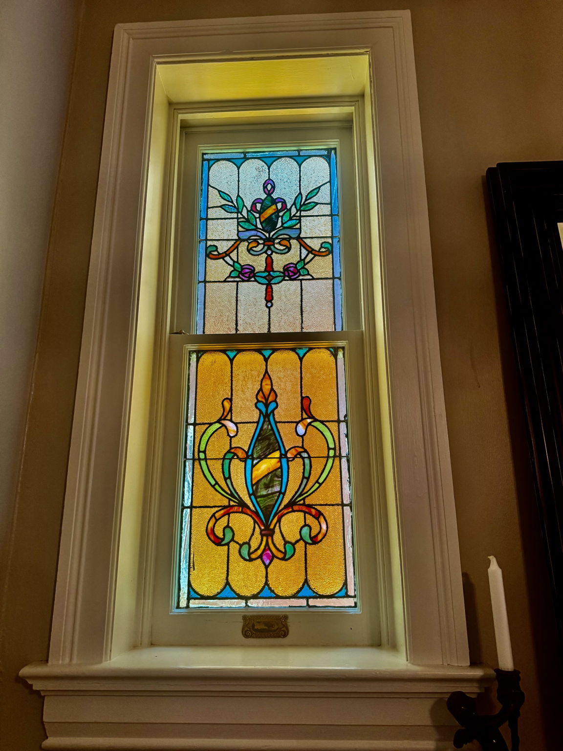 Foyer stain glass at dusk