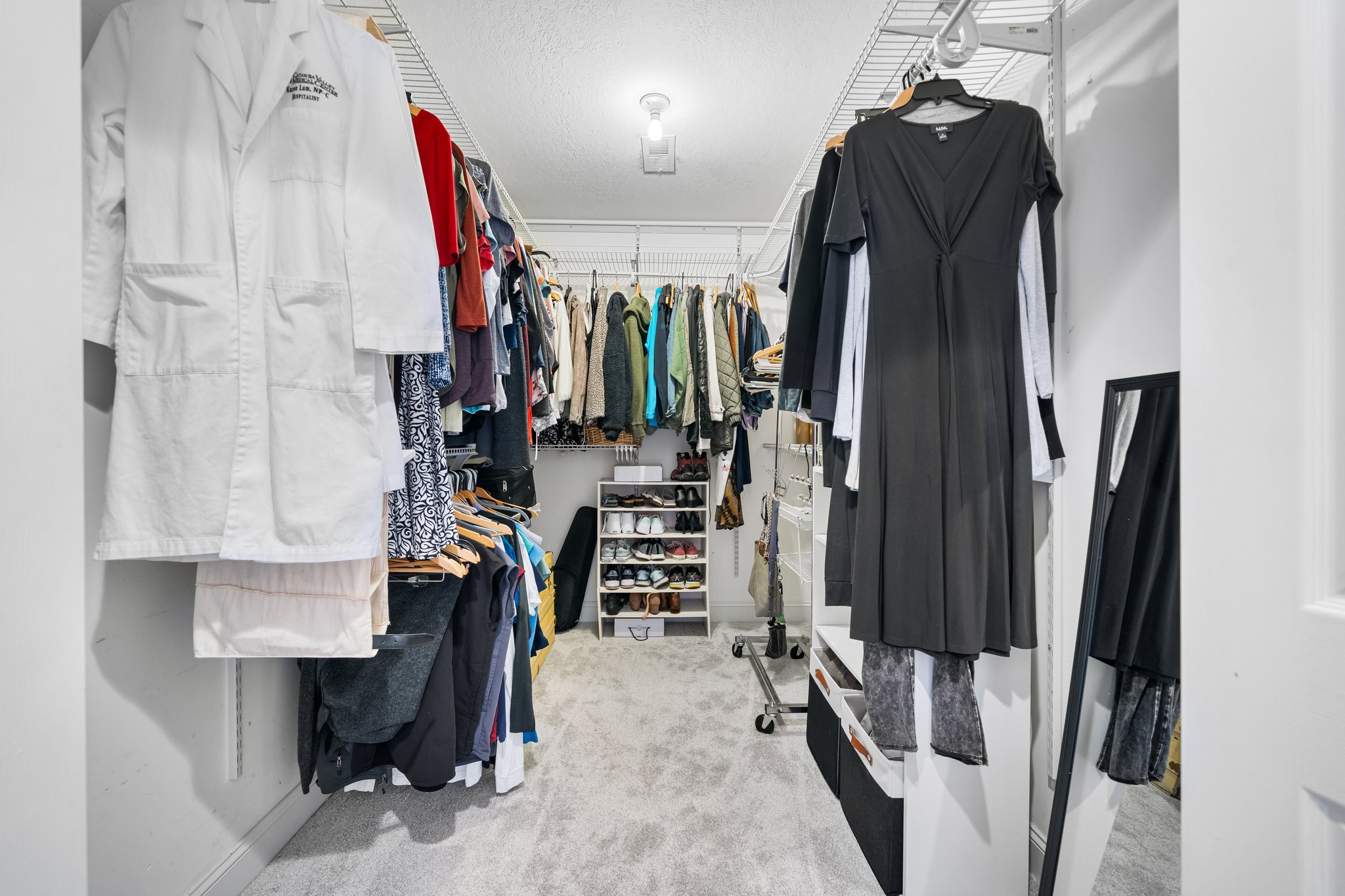 very large walk-in closet in the main bedroom