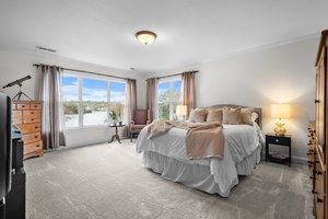 main bedroom with a spectular view of the lake!