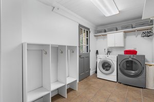 1 of 2 laundry areas and mudroom going outside