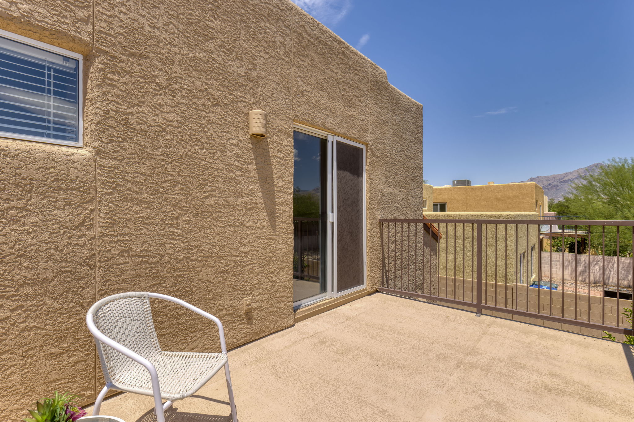 Deck, sliding door to the primary bedroom