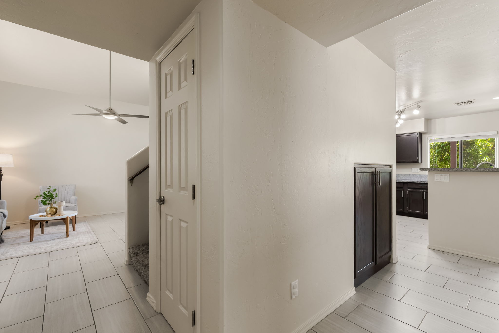 Foyer with hallway to family room/kitchen