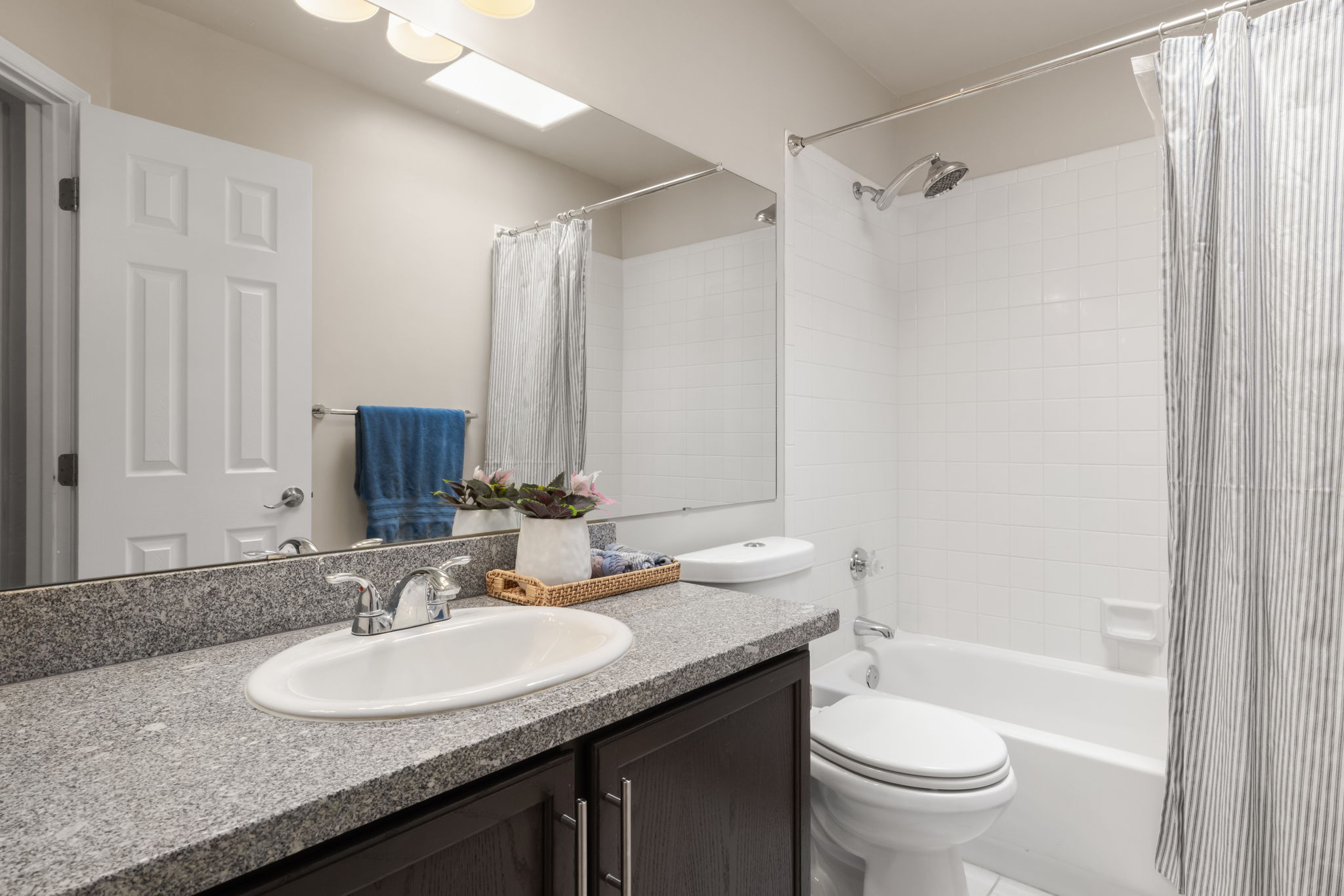 Guest Bath  with tub/shower and large single sink vanity
