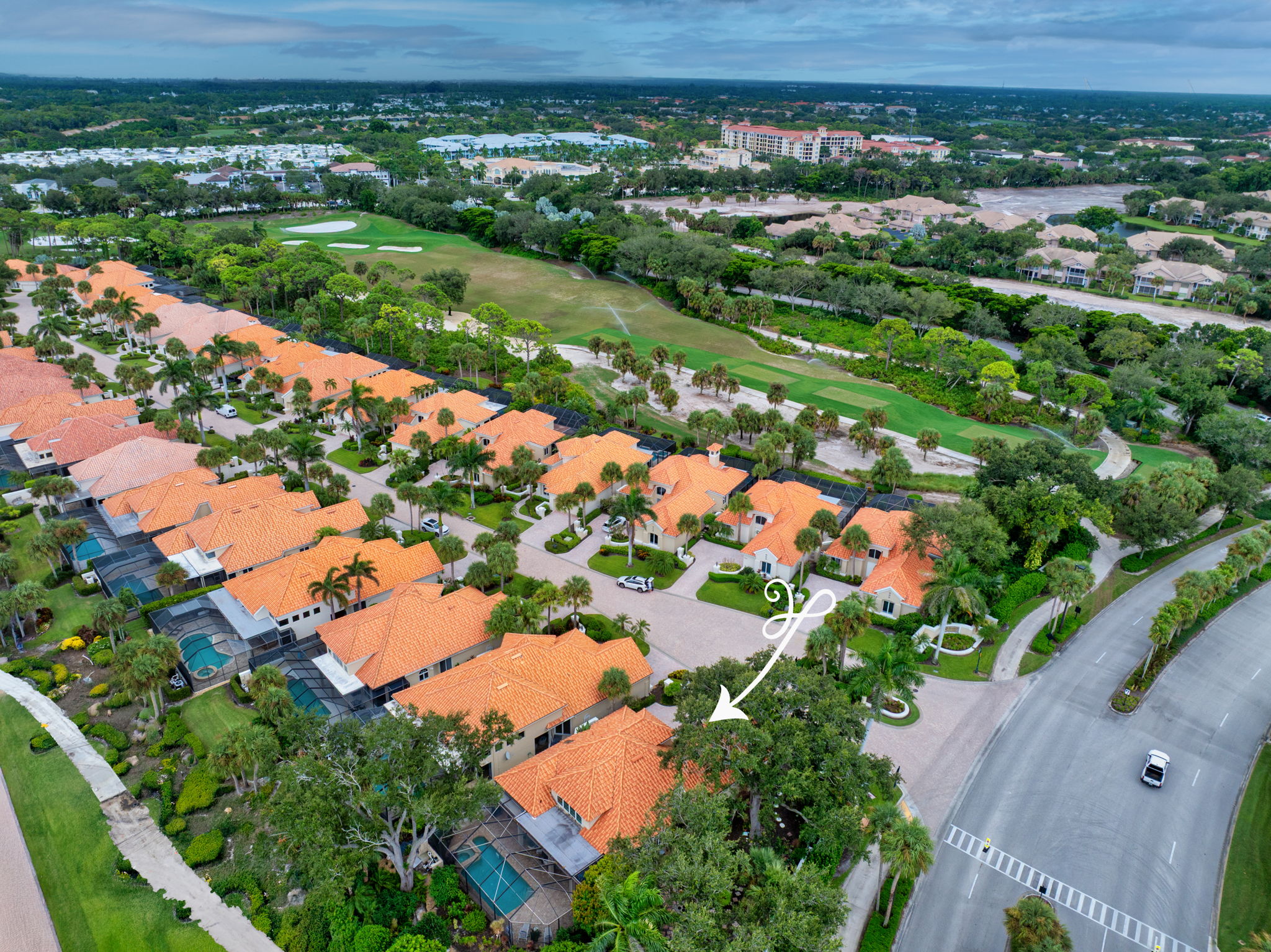 Aerial of home located on the golf course in small enclave of homes