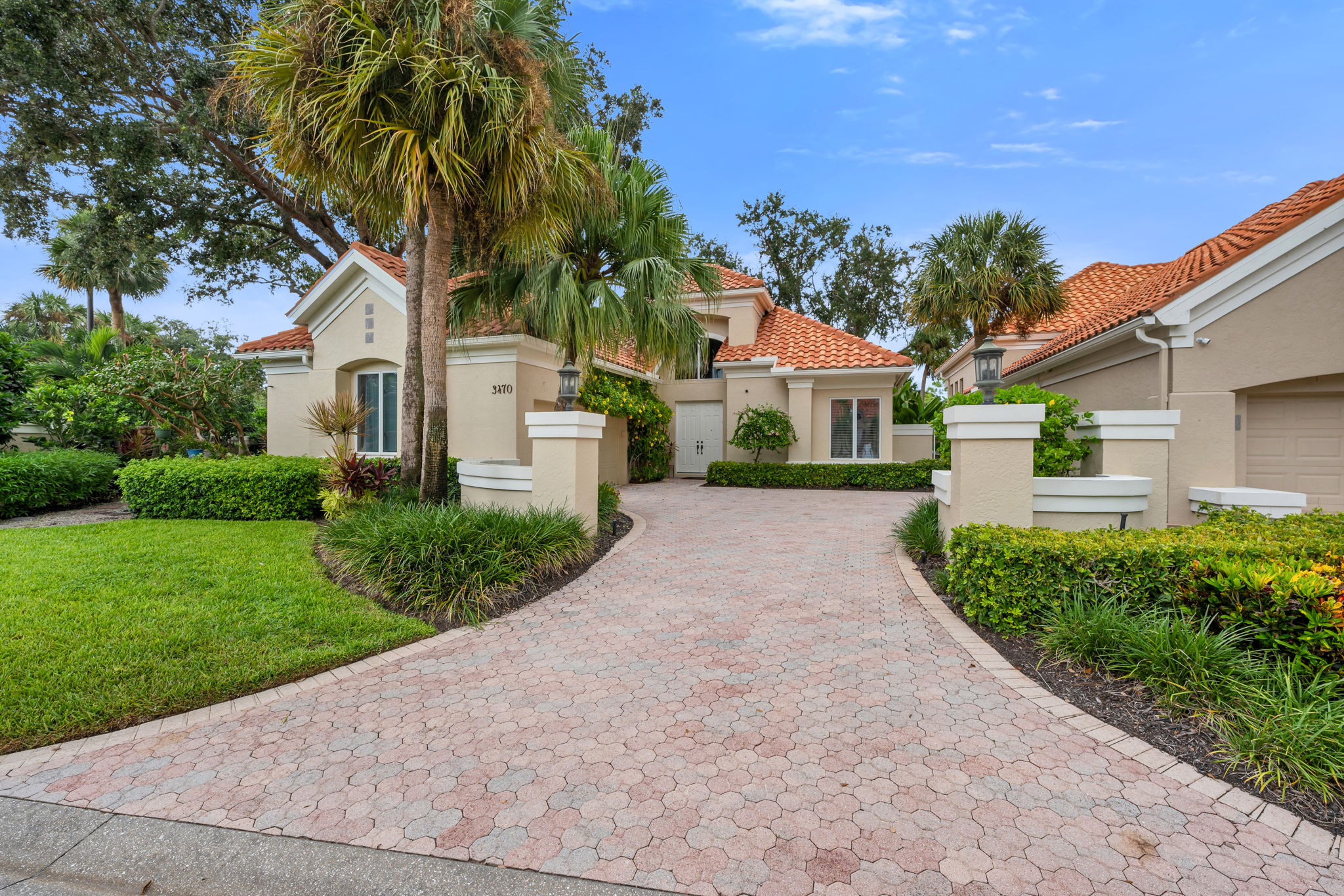 Flowers and lush greenery welcomes you home!