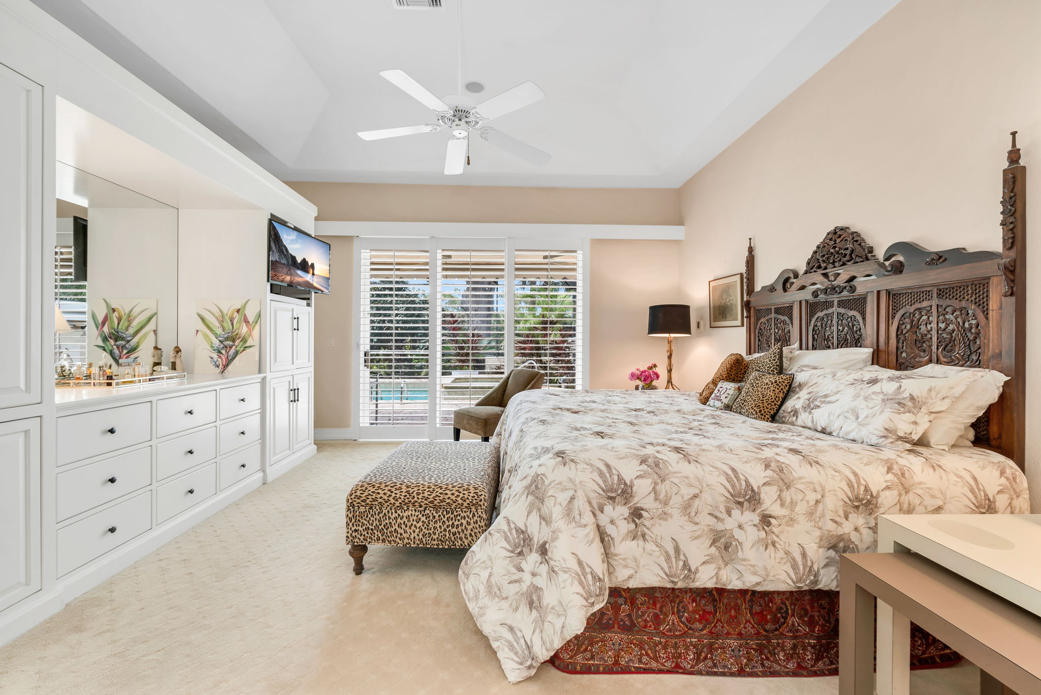 Primary Bedroom with built-in storage plus a walk-in closet outside of bathroom