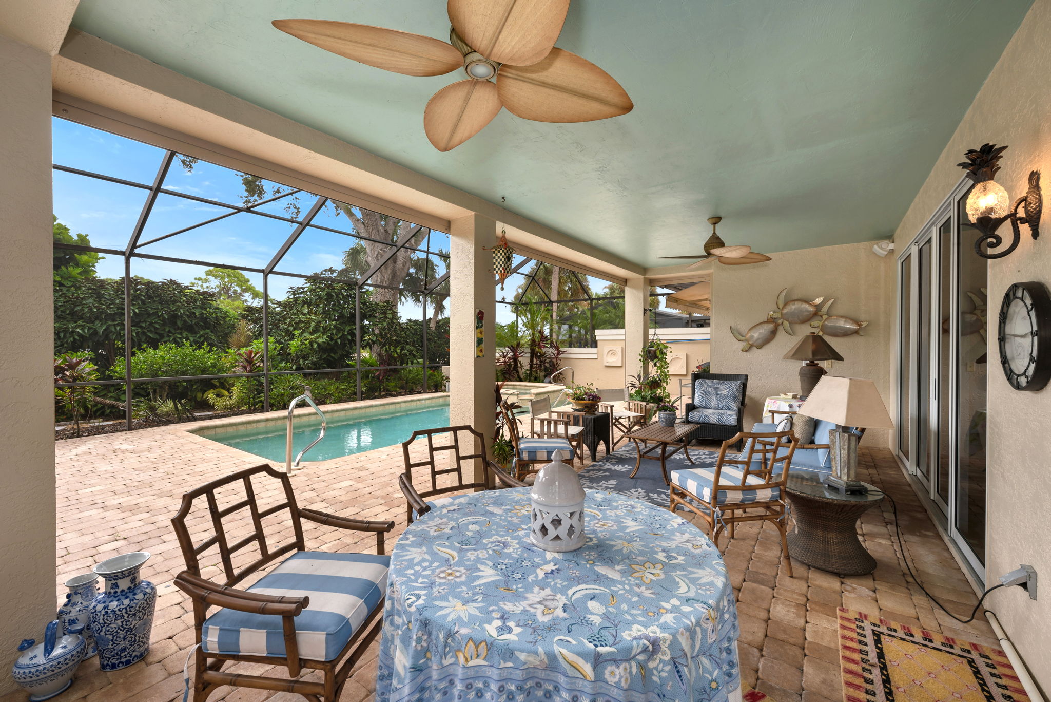Outdoor Living at It's Best! Large covered lanai, hurricane screen, pool and spa