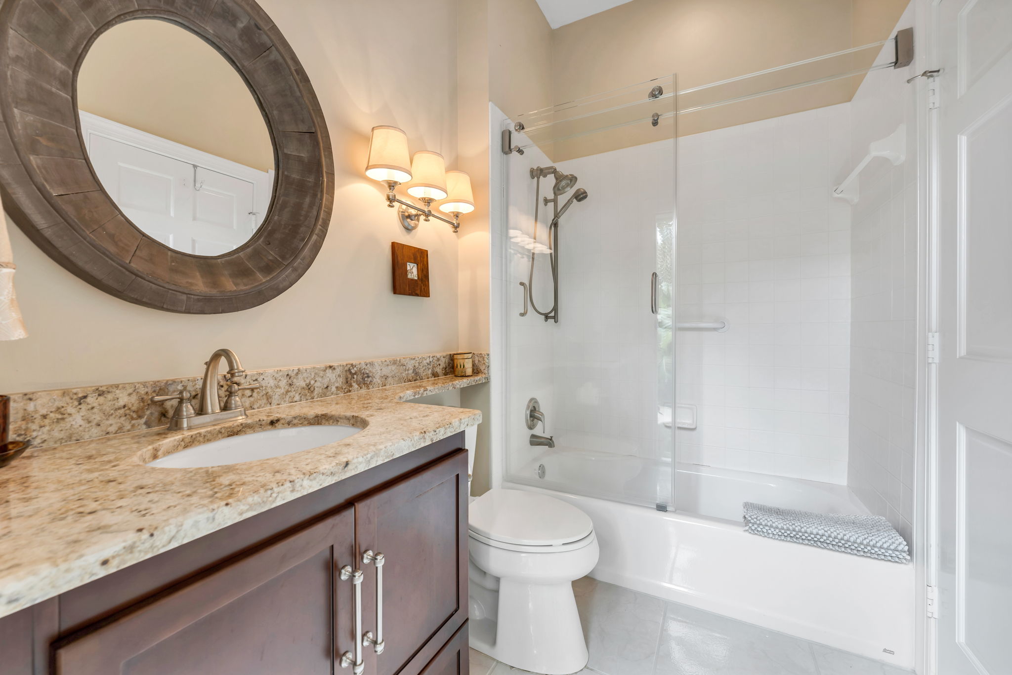 Guest Bedroom updated en-suite bathroom.  Also serves as Pool Bath.