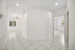 Generous Foyer with Laundry /Utilities to Left | Coat Closet to Right
