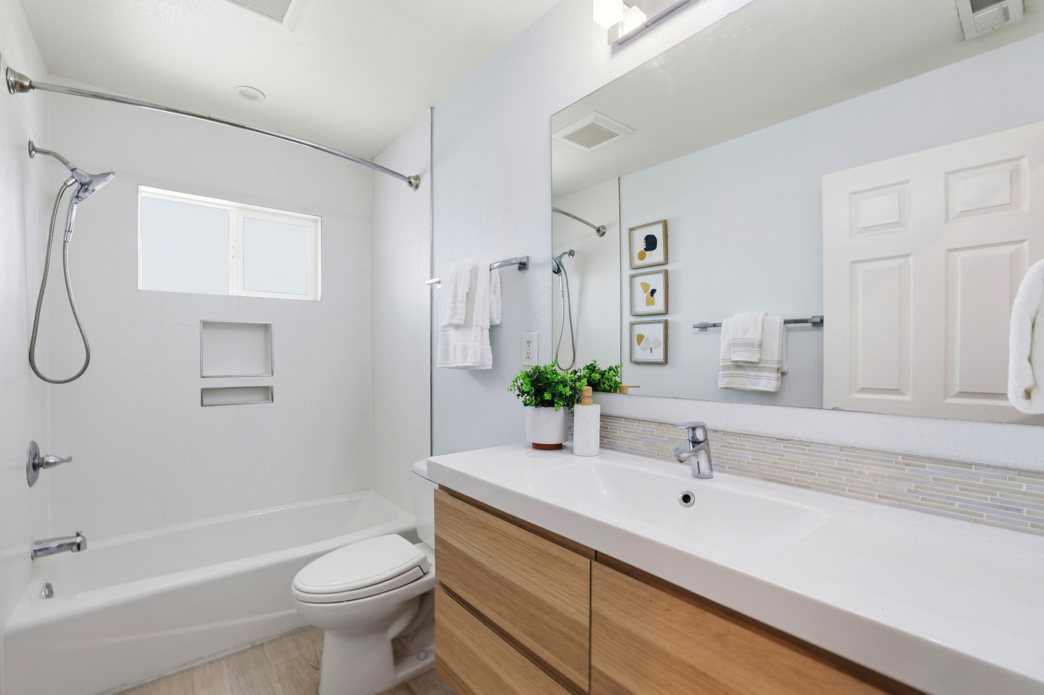 3rd. Bathroom in the hallway