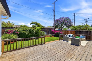 Upgraded Backyard with Teak wood deck & brick walkway