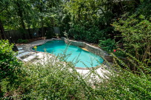View Of Pool From Upper Back Deck