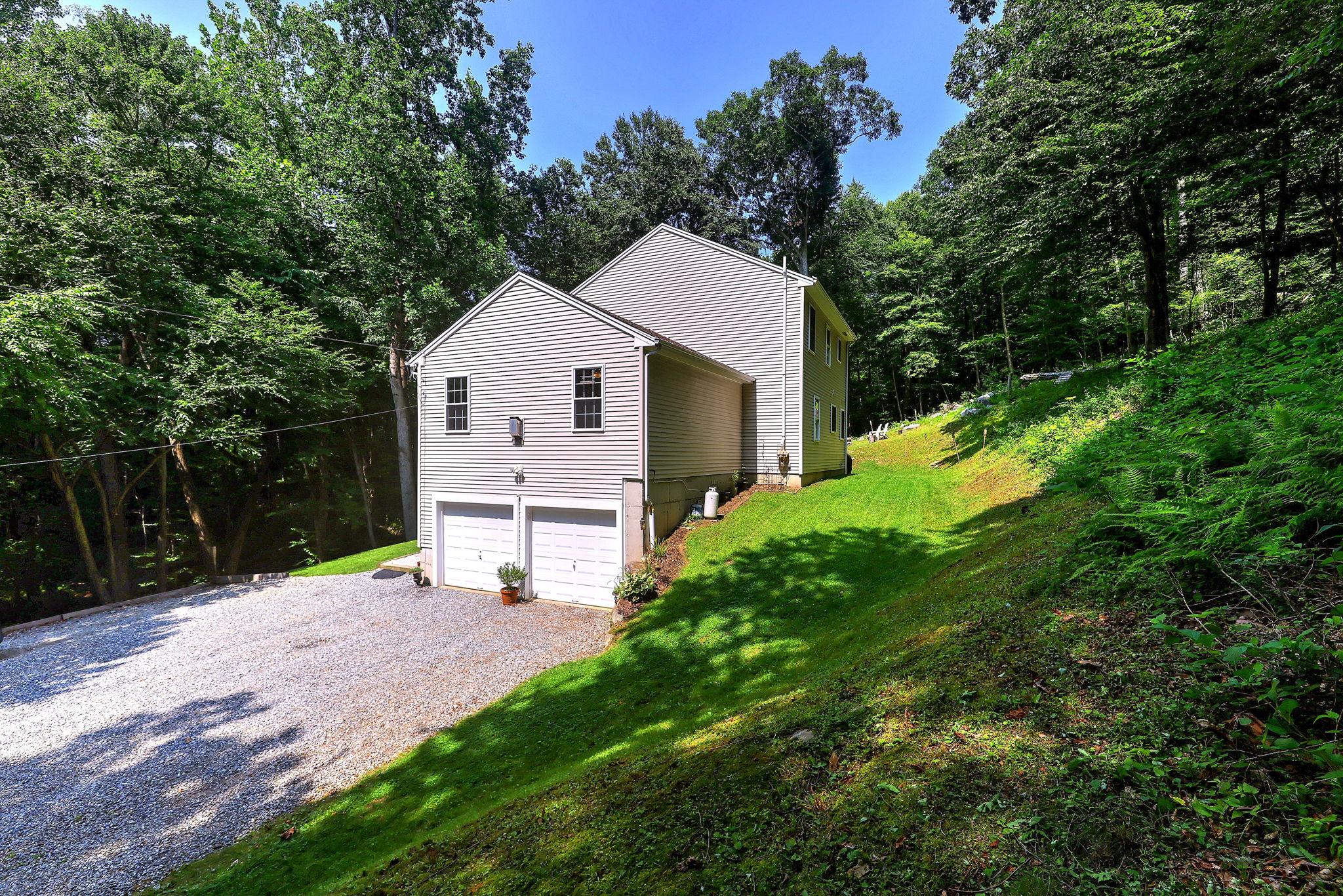 Surrounded by mature trees, this peaceful setting lets you enjoy the sights and sounds of nature.