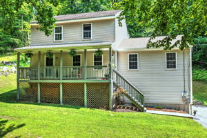Welcome to 35 Charles Road, where timeless Colonial charm meets the serenity of country living.