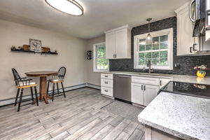 Start your day in this bright, welcoming eat-in kitchen, where morning coffee and everyday moments begin.