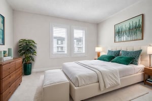 Bright and airy bedroom with windows2 virtually staged.jpeg