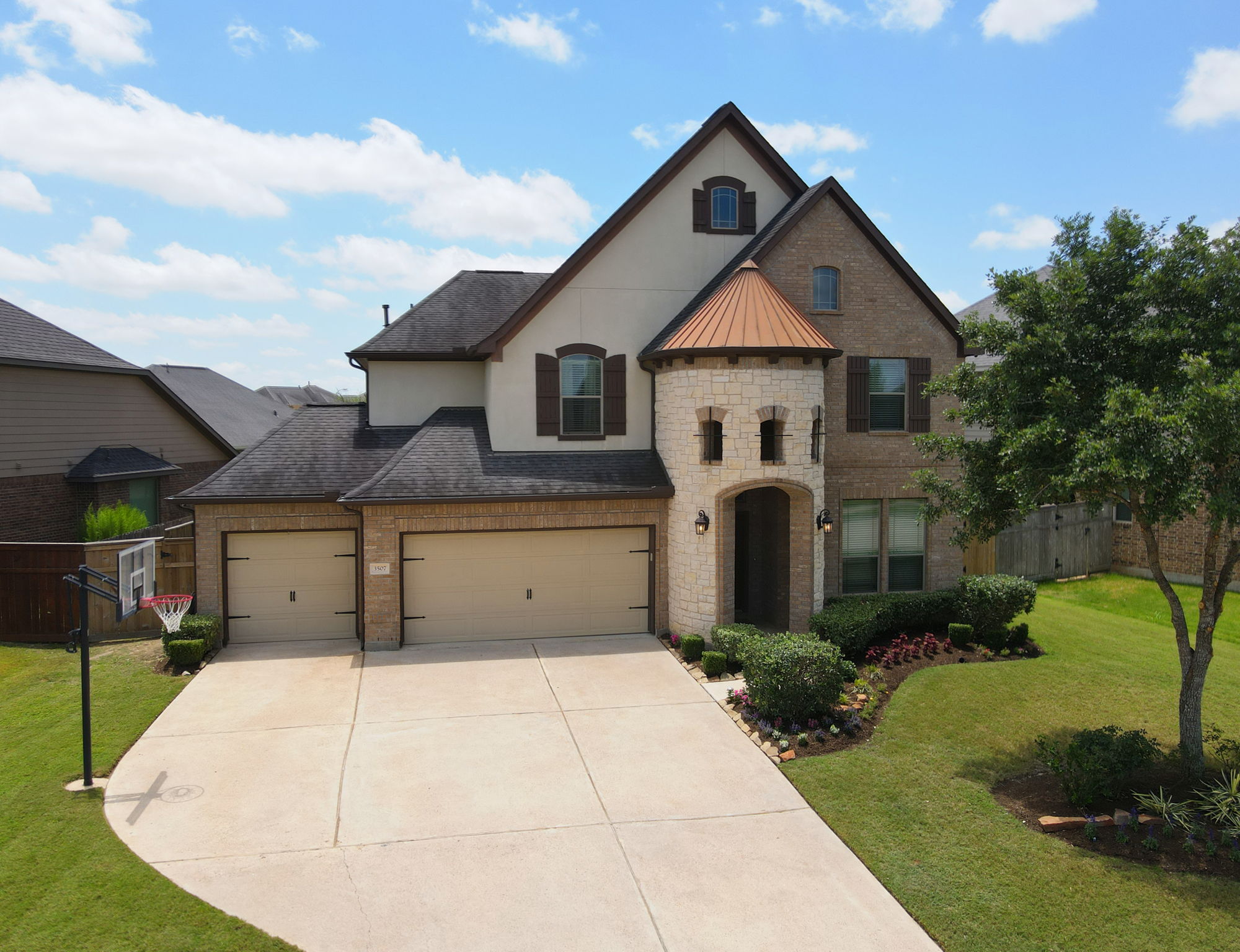 3 Car Garage and wide driveway!