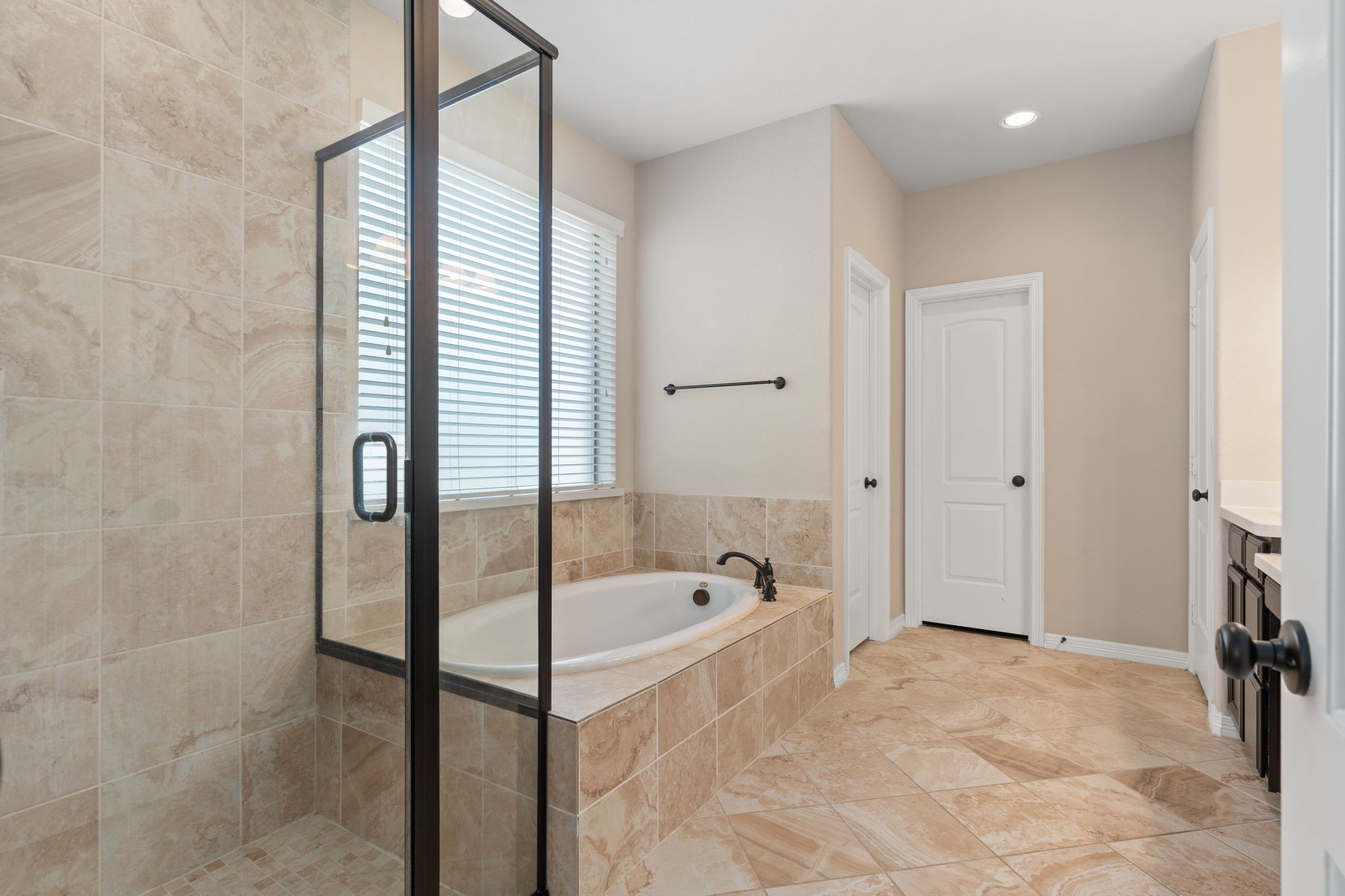 Primary bathroom with separate shower and soaking tub!