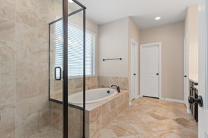 Primary bathroom with separate shower and soaking tub!