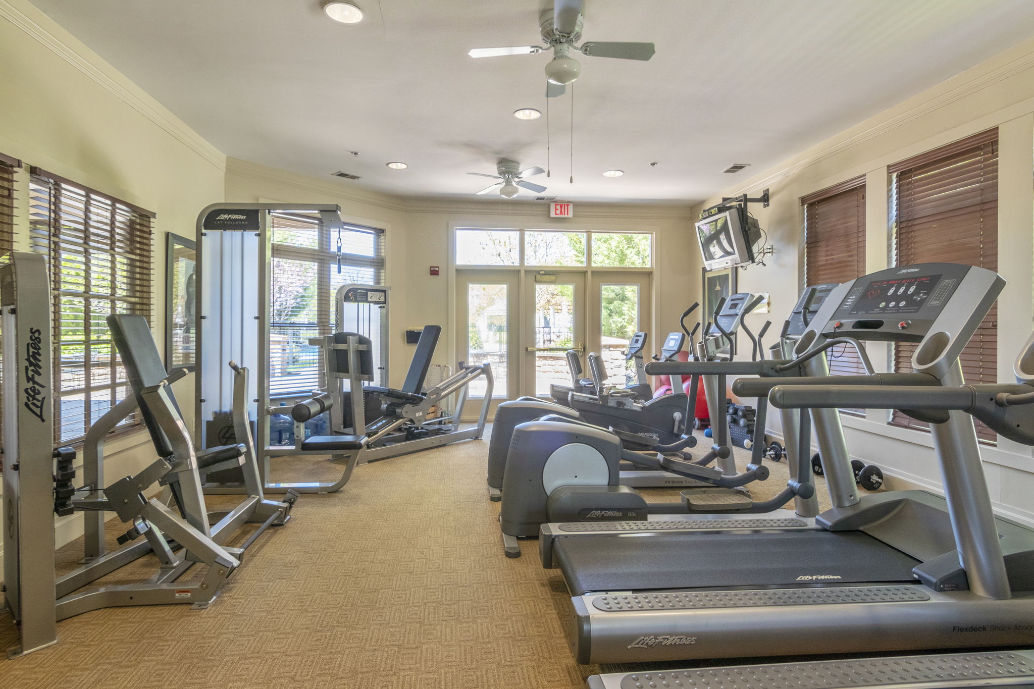 Fitness Room-	Residents enjoy an exceptional lifestyle with access to a library, clubhouse, outdoor pool, hot tub, fitness center, and bocce courts.