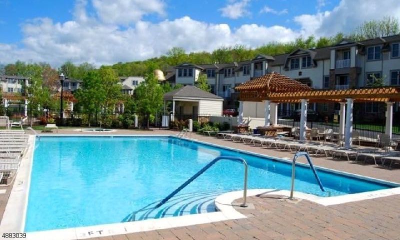 Community Pool-	Residents enjoy an exceptional lifestyle with access to a library, clubhouse, outdoor pool, hot tub, fitness center, and bocce courts.